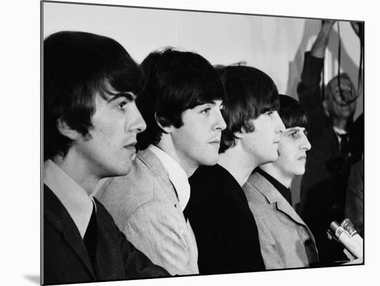 Members of the Beatles During an Interview at Los Angeles International Airport-Bill Ray-Mounted Premium Photographic Print