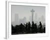Members of the Cascade Bike Club Pause and Take in a Foggy View of the Space Needle-Ted S. Warren-Framed Photographic Print