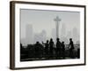 Members of the Cascade Bike Club Pause and Take in a Foggy View of the Space Needle-Ted S. Warren-Framed Photographic Print