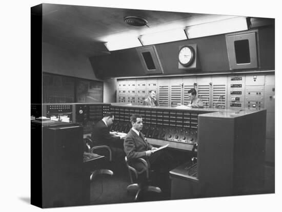 Members of Voice of America Hard Away at Working in a Computer Room-null-Stretched Canvas