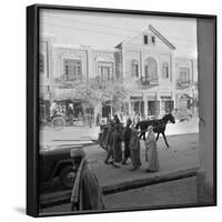 Men and Women, Wearing the Traditional Burqa, Walk Along a Street in Kabul-null-Framed Photographic Print