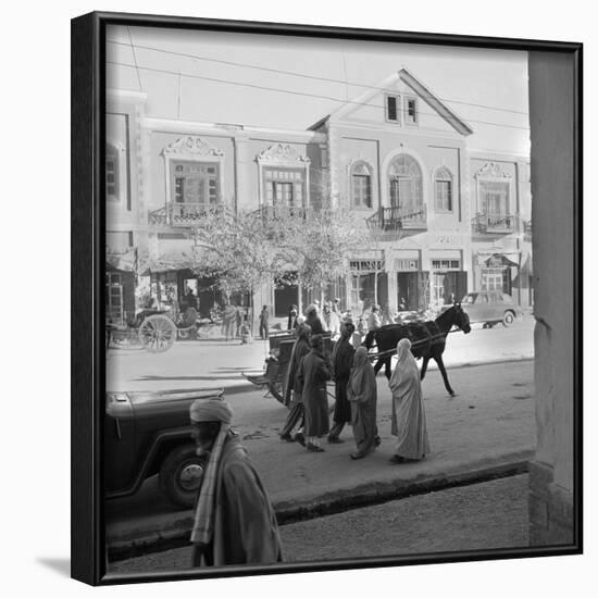 Men and Women, Wearing the Traditional Burqa, Walk Along a Street in Kabul-null-Framed Photographic Print