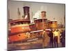 Men at pier looking at 3 Tugboats, One Named "Courageous" with Crewmen on Deck-Andreas Feininger-Mounted Photographic Print