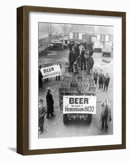 Men Atop Beer Delivery Truck Hoist Cases of Beer Triumphantly While Man Repeal of Prohibition-null-Framed Photographic Print