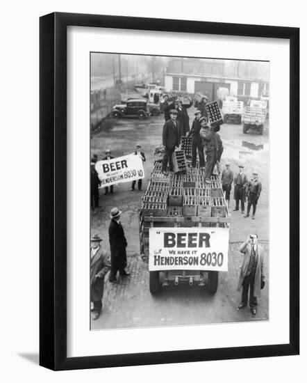 Men Atop Beer Delivery Truck Hoist Cases of Beer Triumphantly While Man Repeal of Prohibition-null-Framed Photographic Print