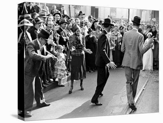 Men dancing in the street as revelers celebrate New Orleans Mardi Gras. February 1938-William Vandivert-Stretched Canvas