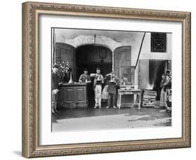 Men Eating Long Spaghetti at a Street Food Shop in Naples, Italy, Ca. 1900-null-Framed Photo