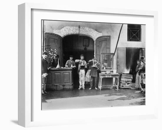 Men Eating Long Spaghetti at a Street Food Shop in Naples, Italy, Ca. 1900-null-Framed Photo