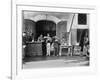 Men Eating Long Spaghetti at a Street Food Shop in Naples, Italy, Ca. 1900-null-Framed Photo