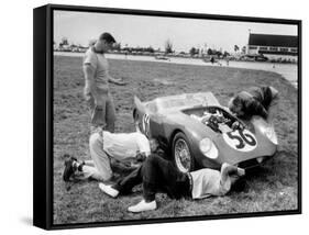 Men Fixing Their Race Car During the Grand Prix-Stan Wayman-Framed Stretched Canvas