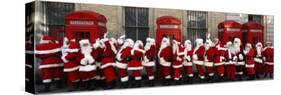 Men from the London Santa School, Dressed in Christmas Outfits, Pose by Telephone Boxes in London-null-Stretched Canvas