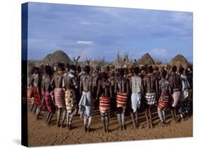 Men Hold Hands Forming a Circle Within Which the Women Dance in the Karo Village of Duss,Ethiopia-John Warburton-lee-Stretched Canvas