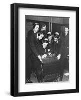 Men Huddled Around Telegraph Transmitter During Training by Federal Vocational Board-null-Framed Photographic Print