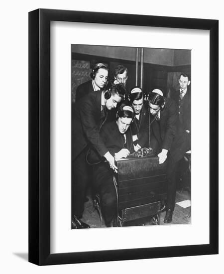 Men Huddled Around Telegraph Transmitter During Training by Federal Vocational Board-null-Framed Photographic Print