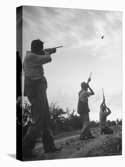 Men Hunting Doves-Cornell Capa-Stretched Canvas