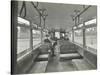 Men in Hats and Coats in the Interior of an Electric Tram, London, 1933-null-Stretched Canvas