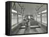 Men in Hats and Coats in the Interior of an Electric Tram, London, 1933-null-Framed Stretched Canvas