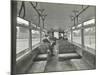 Men in Hats and Coats in the Interior of an Electric Tram, London, 1933-null-Mounted Photographic Print