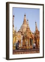 Men Laying Out Oil Lamps for Evening Ceremony at Buddhist Temple-Stephen Studd-Framed Photographic Print