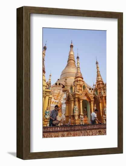 Men Laying Out Oil Lamps for Evening Ceremony at Buddhist Temple-Stephen Studd-Framed Photographic Print