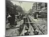 Men Laying Tramlines in the Middle of the Road, Whitechapel High Street, London, 1929-null-Mounted Photographic Print