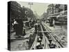 Men Laying Tramlines in the Middle of the Road, Whitechapel High Street, London, 1929-null-Stretched Canvas