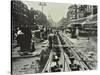 Men Laying Tramlines in the Middle of the Road, Whitechapel High Street, London, 1929-null-Stretched Canvas