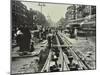 Men Laying Tramlines in the Middle of the Road, Whitechapel High Street, London, 1929-null-Mounted Photographic Print