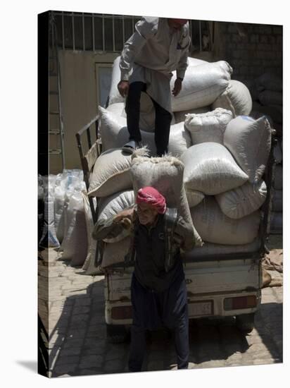 Men Loading Grain, Aleppo (Haleb), Syria, Middle East-Christian Kober-Stretched Canvas