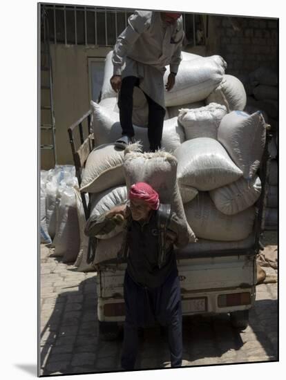 Men Loading Grain, Aleppo (Haleb), Syria, Middle East-Christian Kober-Mounted Photographic Print