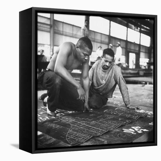 Men Looking at Blueprints at One of the Sun Shipbuilding and Drydock Co. Shipyards-null-Framed Stretched Canvas