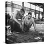 Men Looking at Blueprints at One of the Sun Shipbuilding and Drydock Co. Shipyards-null-Stretched Canvas