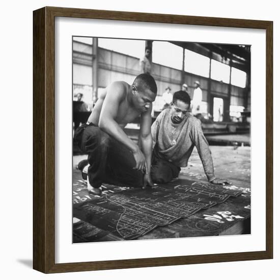 Men Looking at Blueprints at One of the Sun Shipbuilding and Drydock Co. Shipyards-null-Framed Photographic Print