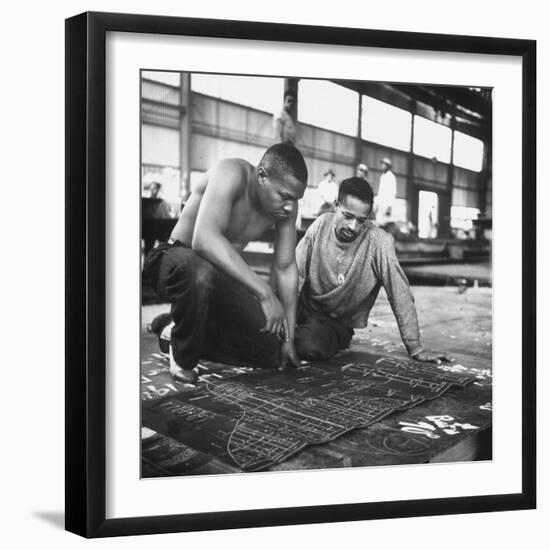 Men Looking at Blueprints at One of the Sun Shipbuilding and Drydock Co. Shipyards-null-Framed Photographic Print