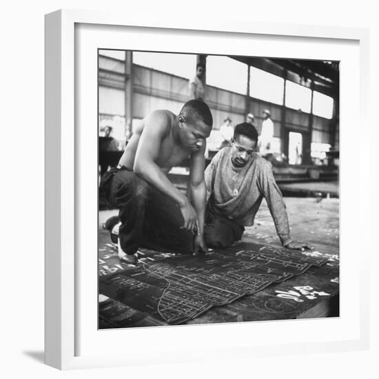 Men Looking at Blueprints at One of the Sun Shipbuilding and Drydock Co. Shipyards-null-Framed Photographic Print