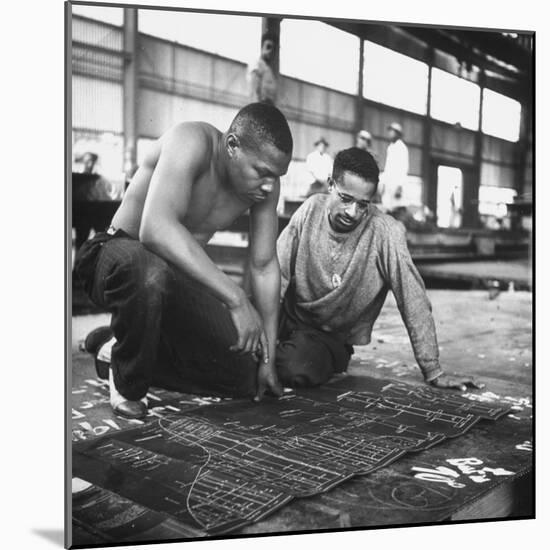 Men Looking at Blueprints at One of the Sun Shipbuilding and Drydock Co. Shipyards-null-Mounted Photographic Print
