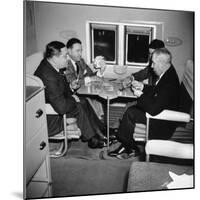 Men Playing a Card Game While Riding Aboard the Atlantic Clipper-Bernard Hoffman-Mounted Premium Photographic Print