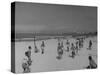 Men Playing a Game of Volleyball on the Beach-null-Stretched Canvas