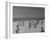 Men Playing a Game of Volleyball on the Beach-null-Framed Photographic Print