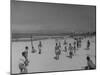 Men Playing a Game of Volleyball on the Beach-null-Mounted Photographic Print