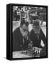 Men Playing Chess in Central Park-Leonard Mccombe-Framed Stretched Canvas