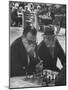 Men Playing Chess in Central Park-Leonard Mccombe-Mounted Photographic Print