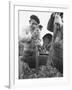 Men Pounding the Grapes to Smash Them-null-Framed Photographic Print