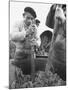 Men Pounding the Grapes to Smash Them-null-Mounted Photographic Print