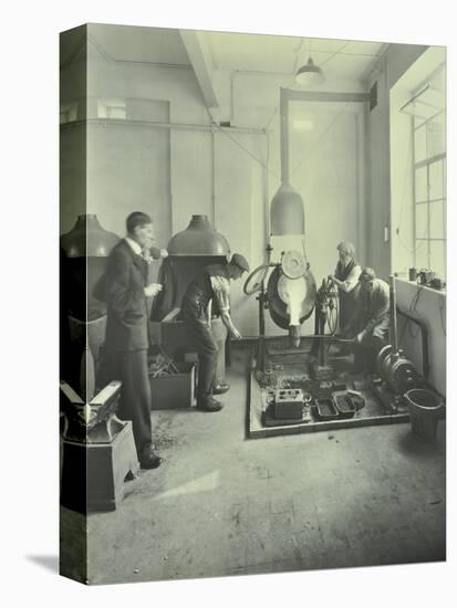 Men Pouring Molten Metal in a Foundry, School of Engineering and Navigation, London, 1931-null-Stretched Canvas