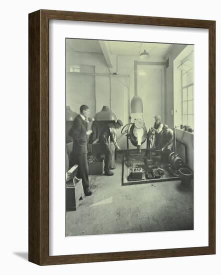 Men Pouring Molten Metal in a Foundry, School of Engineering and Navigation, London, 1931-null-Framed Photographic Print