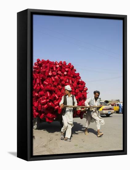 Men Pulling Wooden Cart Piled with Red Water Containers Along Road, Balkh Province, Afghanistan-Jane Sweeney-Framed Stretched Canvas