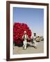 Men Pulling Wooden Cart Piled with Red Water Containers Along Road, Balkh Province, Afghanistan-Jane Sweeney-Framed Photographic Print