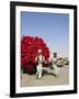 Men Pulling Wooden Cart Piled with Red Water Containers Along Road, Balkh Province, Afghanistan-Jane Sweeney-Framed Photographic Print