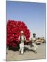 Men Pulling Wooden Cart Piled with Red Water Containers Along Road, Balkh Province, Afghanistan-Jane Sweeney-Mounted Photographic Print